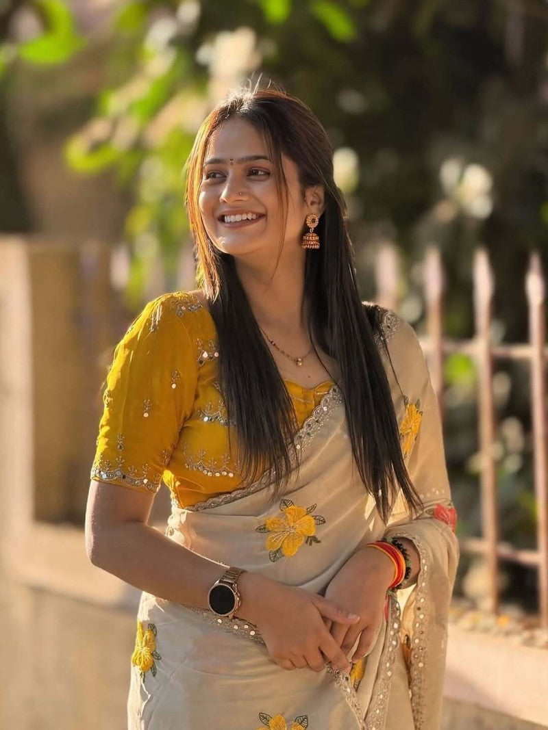 Graceful Cream Saree with Floral Work & Designer Yellow Blouse
