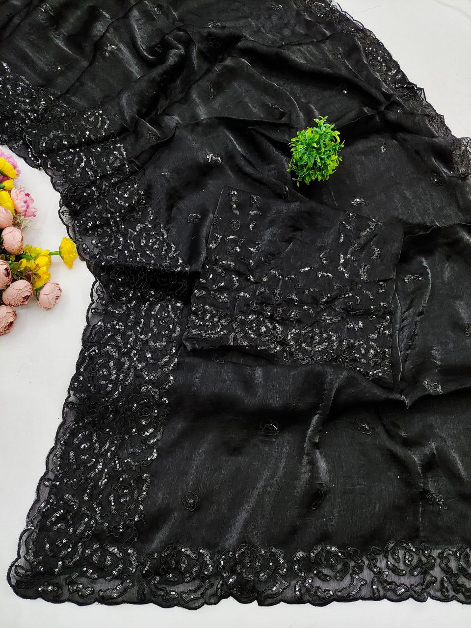 Classic Black Party Wear Saree with Subtle Embroidery Work
