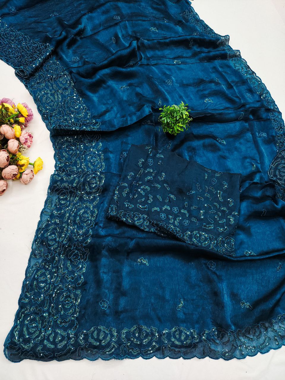 Classic Black Party Wear Saree with Subtle Embroidery Work