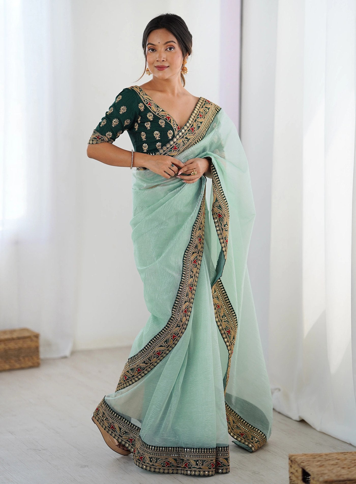 Stylish Mint Green Saree with Heavy Embroidered Lace Border
