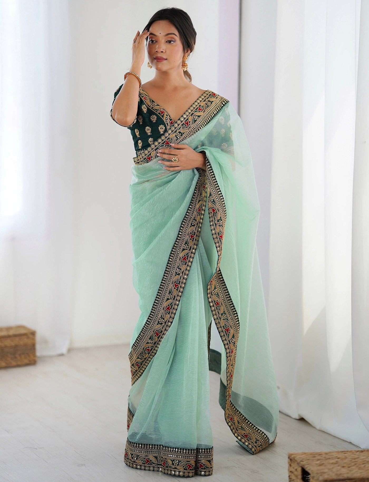 Stylish Mint Green Saree with Heavy Embroidered Lace Border