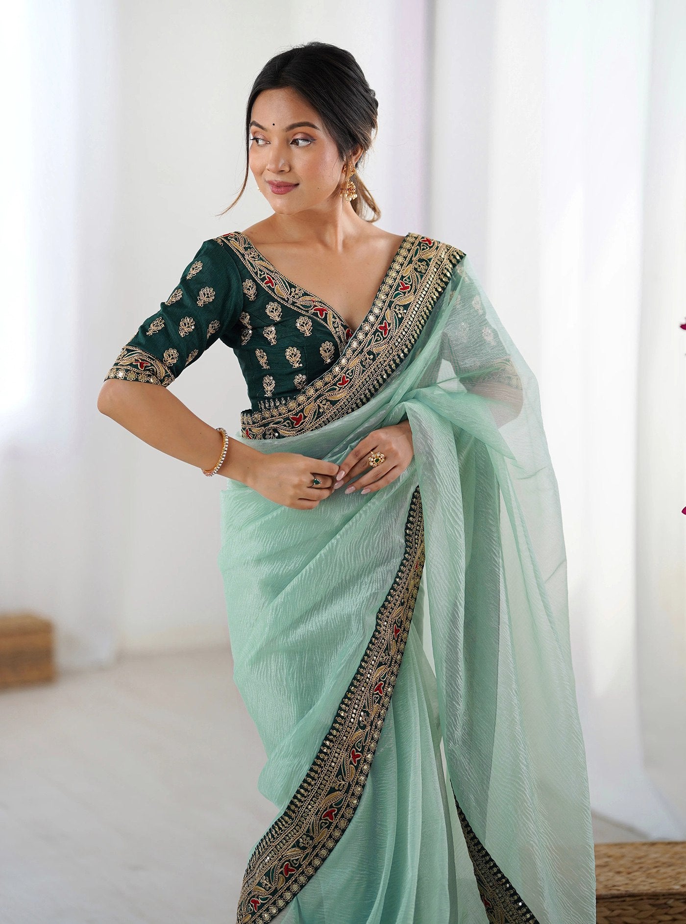 Stylish Mint Green Saree with Heavy Embroidered Lace Border