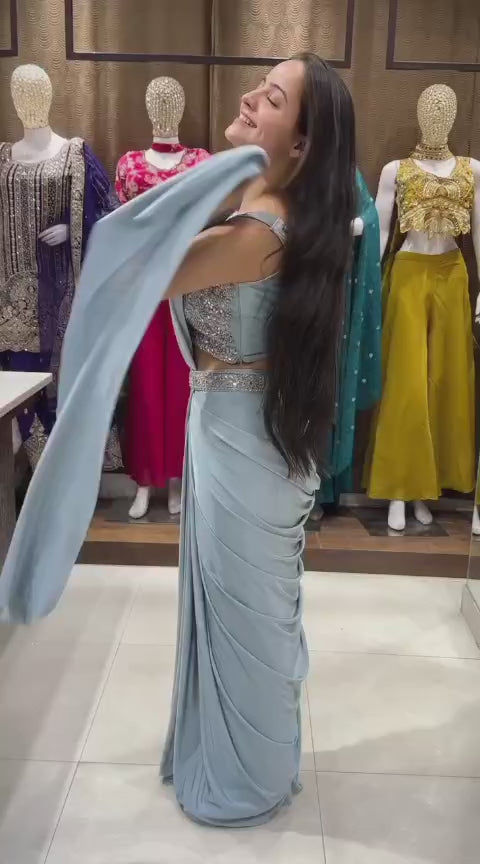 Graceful Powder Blue Saree with Embellished Jacket Style Look